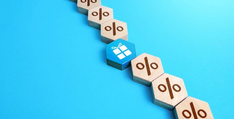 Wooden hexagon tiles on a blue background, showing percentage signs and a blue gift in the middle of the row.